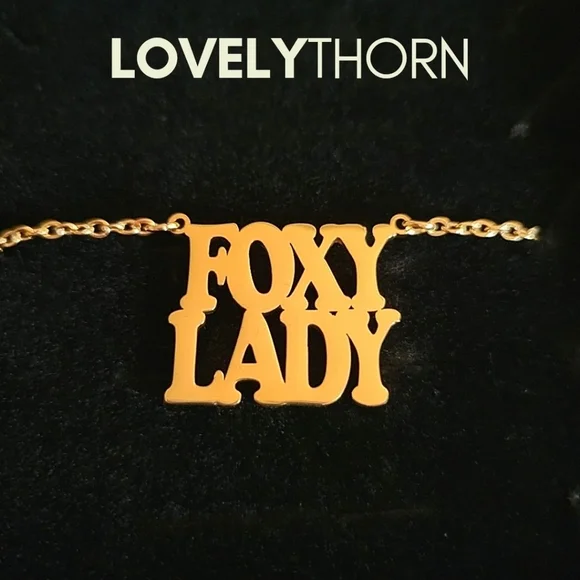 LOVELYTHORN // custom foxy lady 18K gold-plated 16 stainless steel nameplate